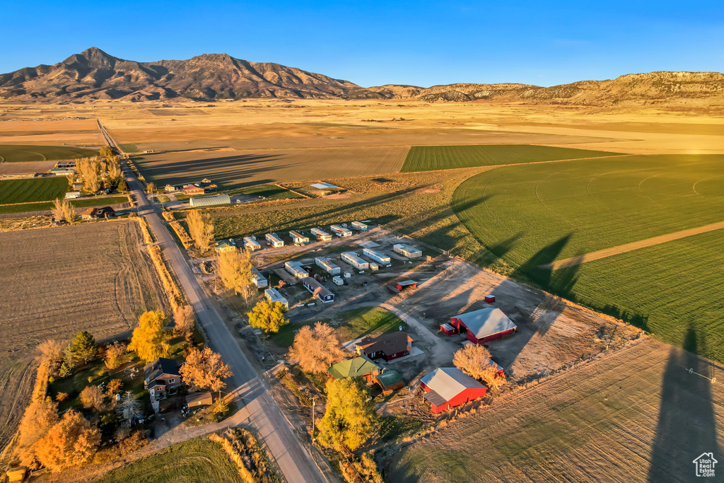 Drone / aerial view with a mountain view and a rural view