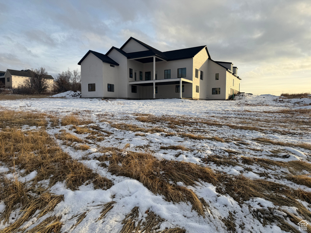 View of snow covered property