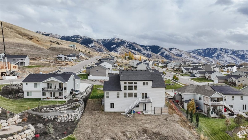 Exterior space featuring a mountain view