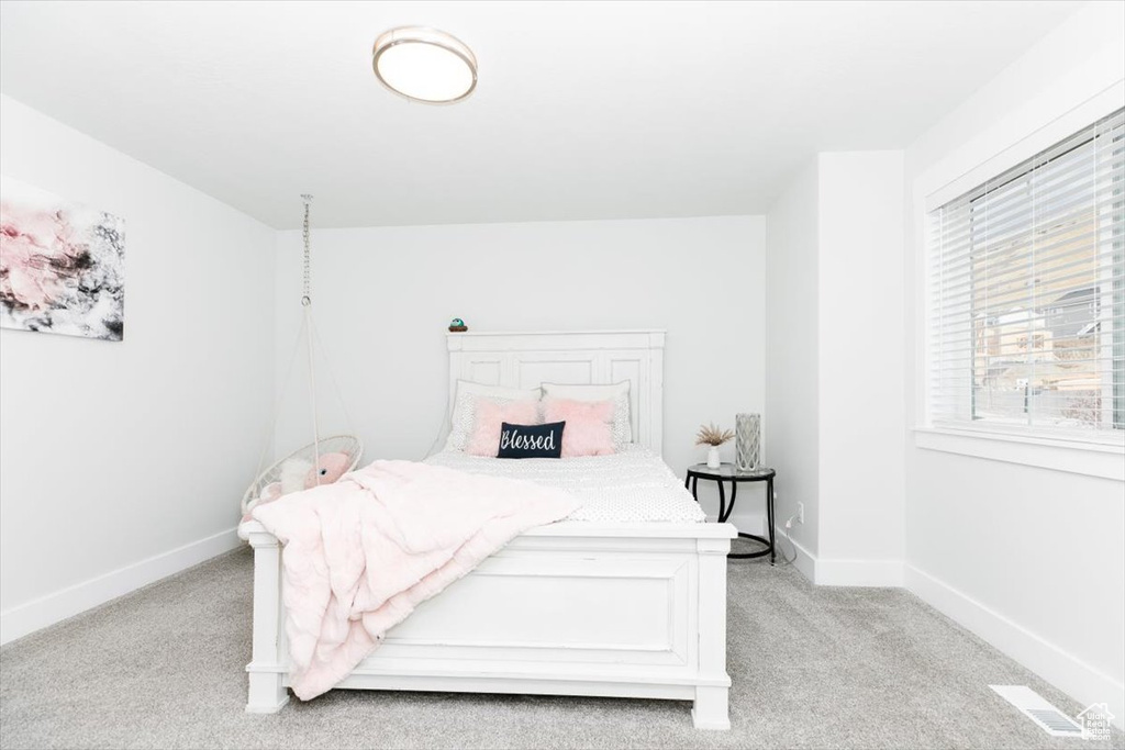 View of carpeted bedroom