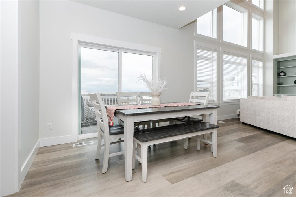 Dining area featuring light wood-type flooring