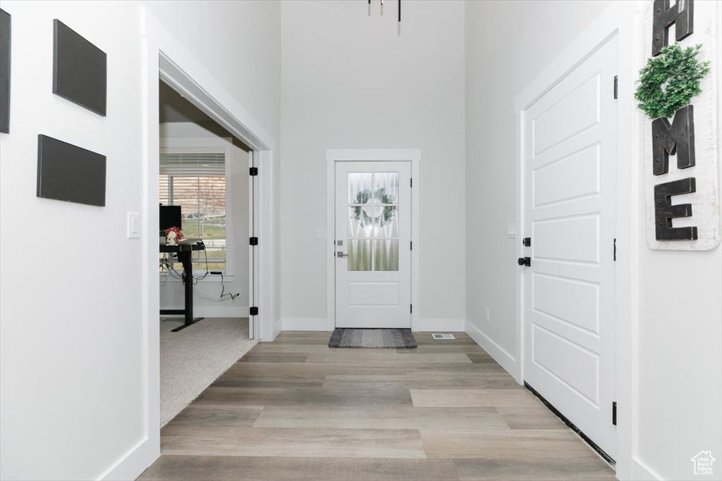 Foyer featuring light hardwood / wood-style flooring