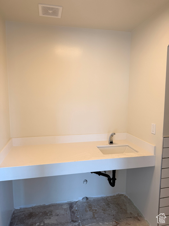 Bathroom with visible vents and a sink