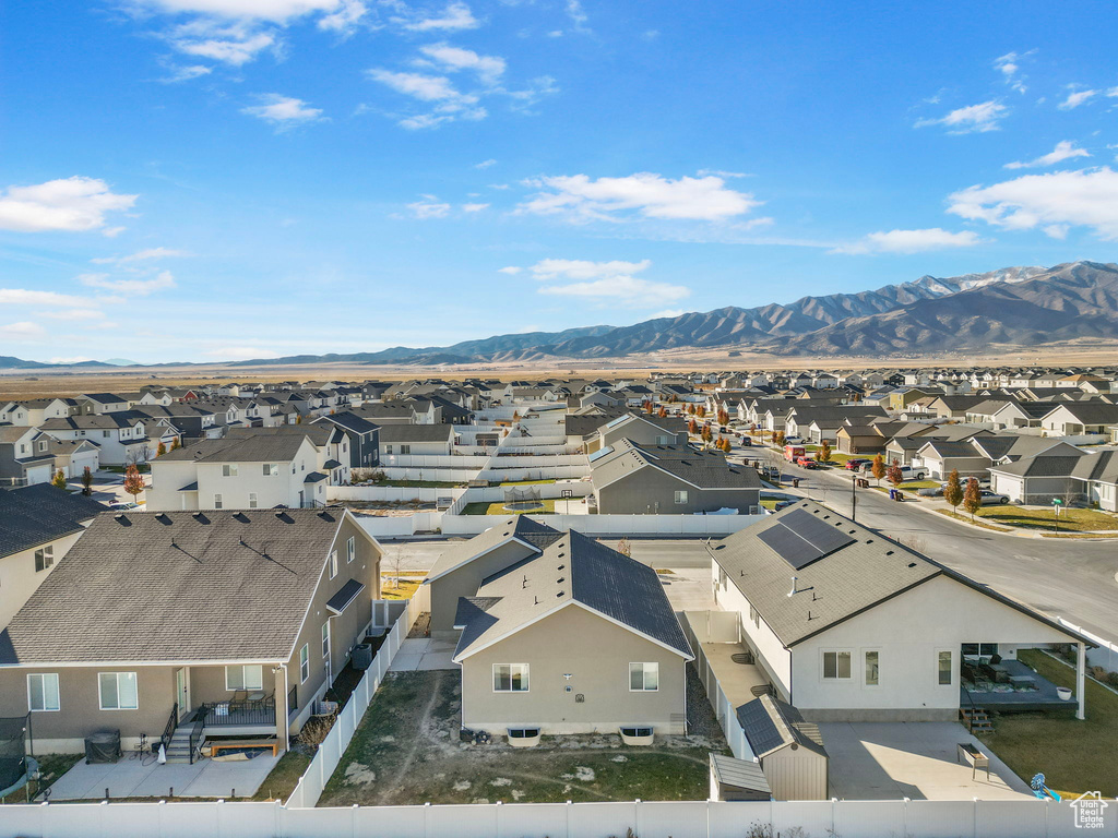 Birds eye view of property with a mountain view