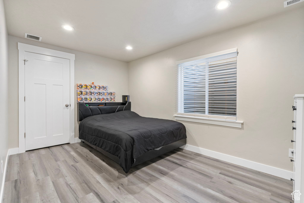 Bedroom featuring light wood-type flooring