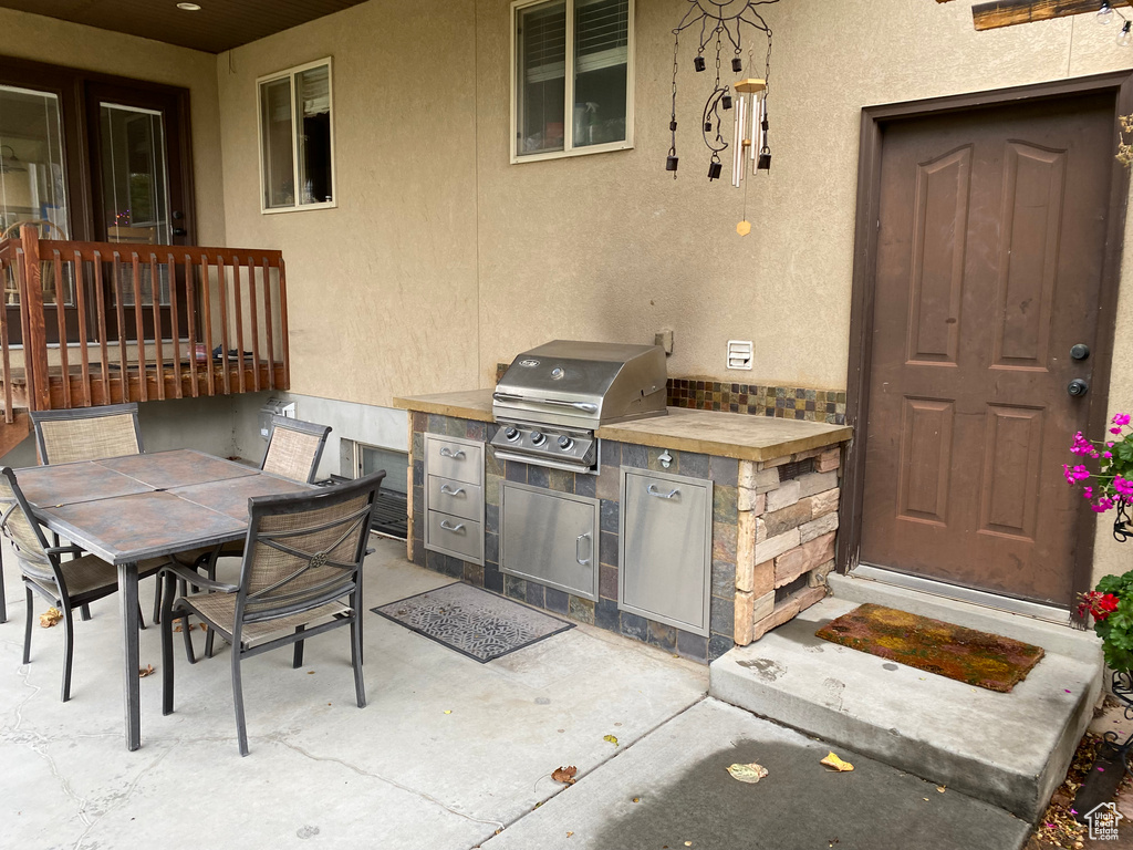 View of patio / terrace with grilling area and exterior kitchen