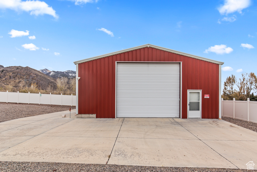 Garage featuring a mountain view