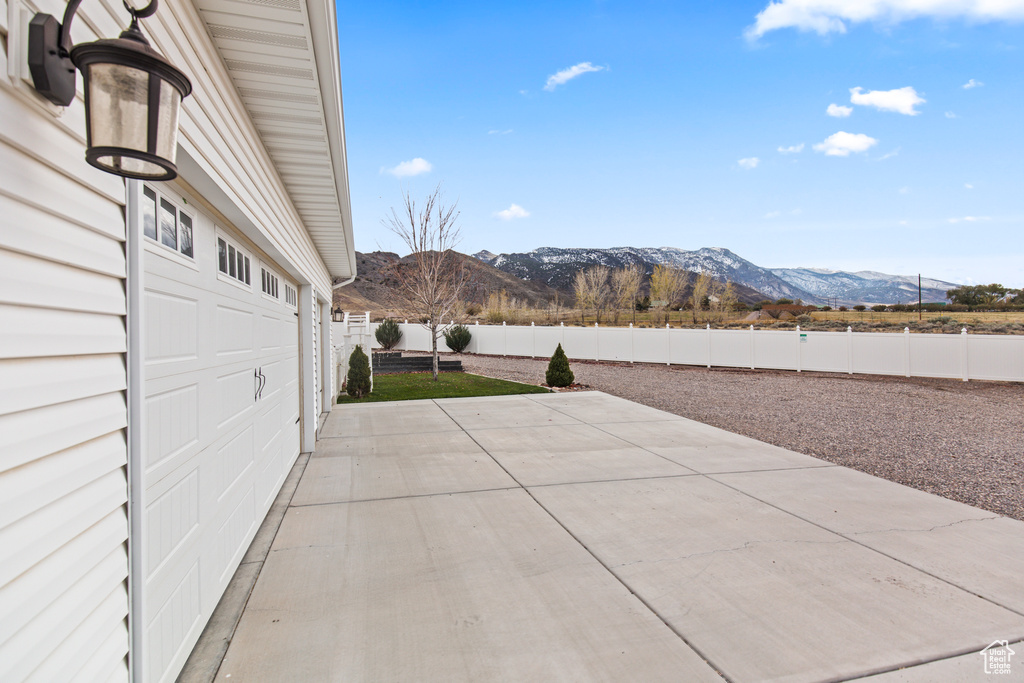 View of patio featuring a mountain view