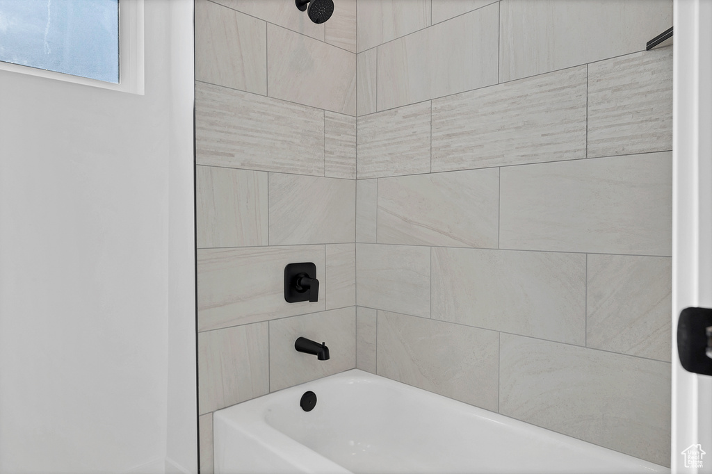 Bathroom with shower / tub combination