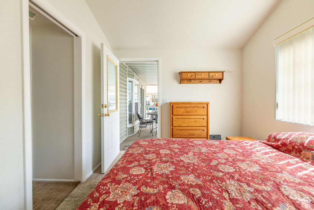 Carpeted bedroom with baseboards