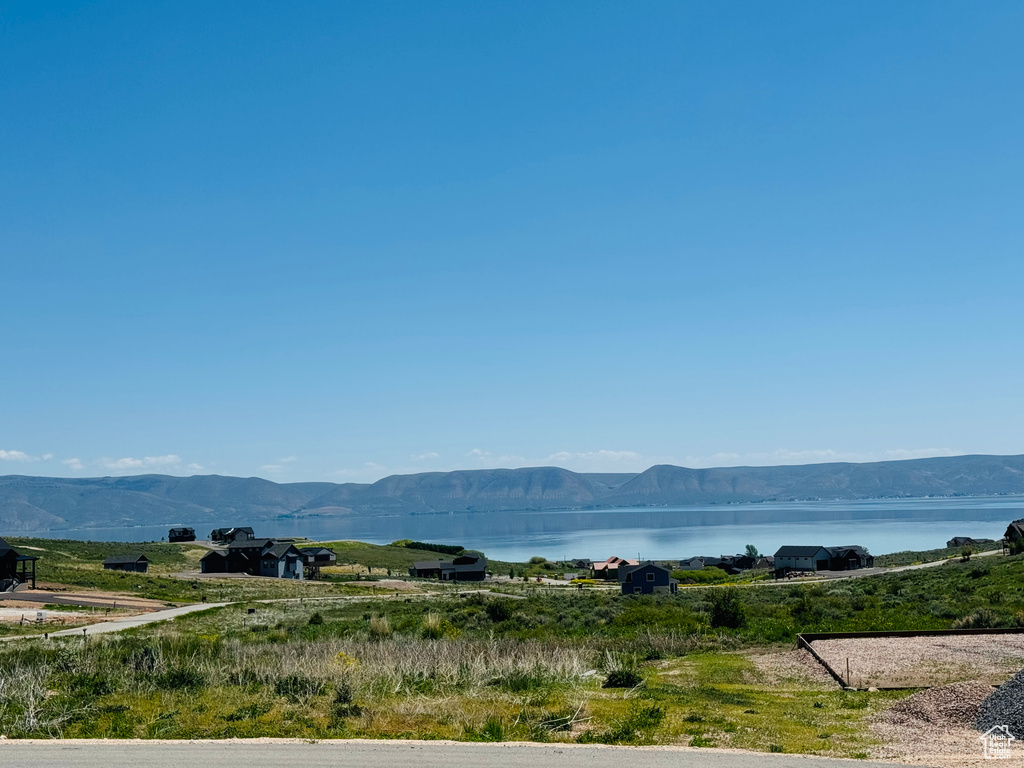 View of mountain background with a nearby body of water