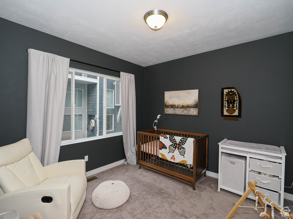 View of carpeted bedroom