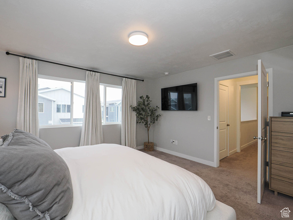 View of carpeted bedroom