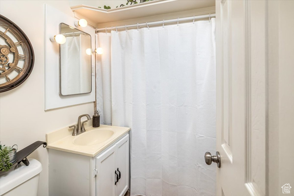 Bathroom with vanity and toilet