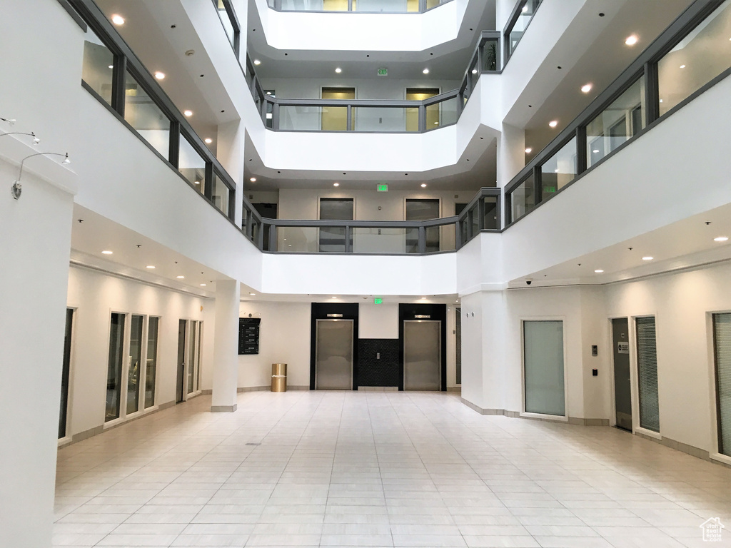 Common area featuring a towering ceiling
