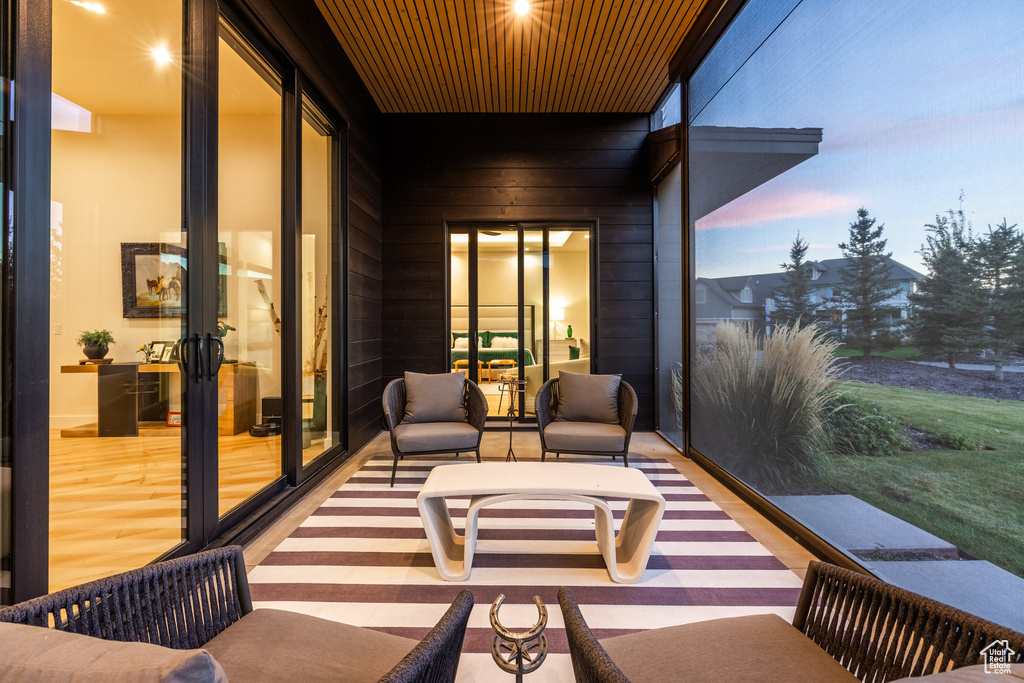 Patio terrace at dusk with french doors