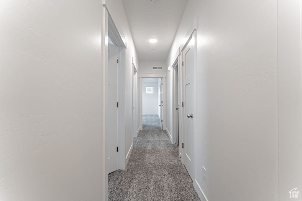Corridor with carpet floors