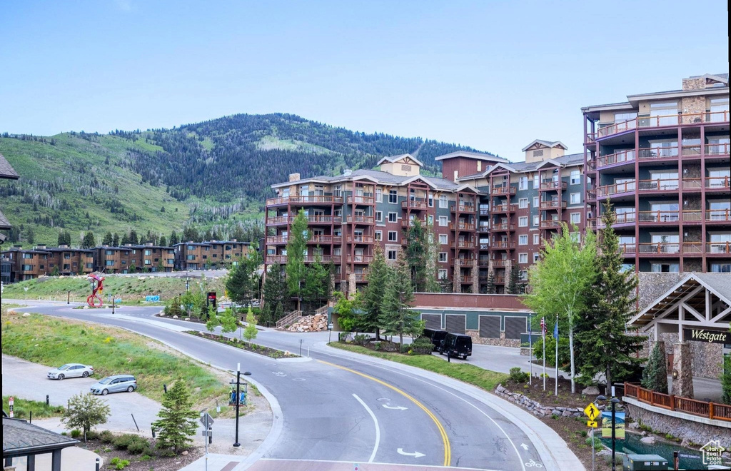 View of apartment building / complex with a mountain view