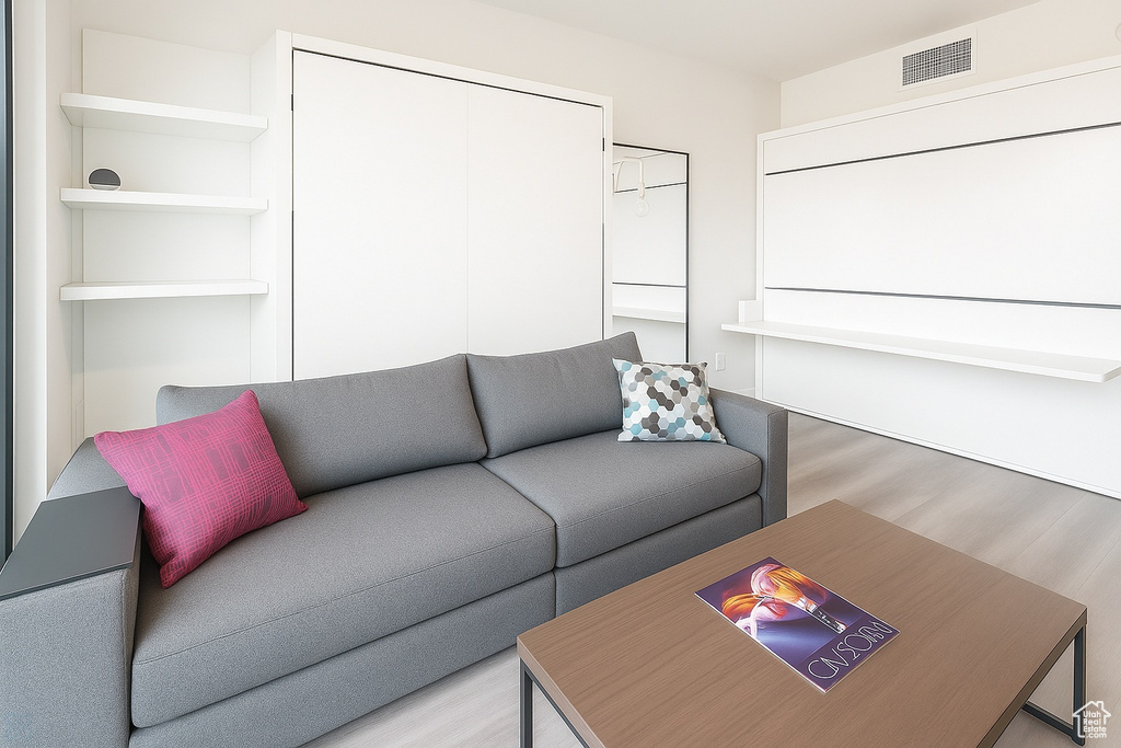 Living area with wood finished floors