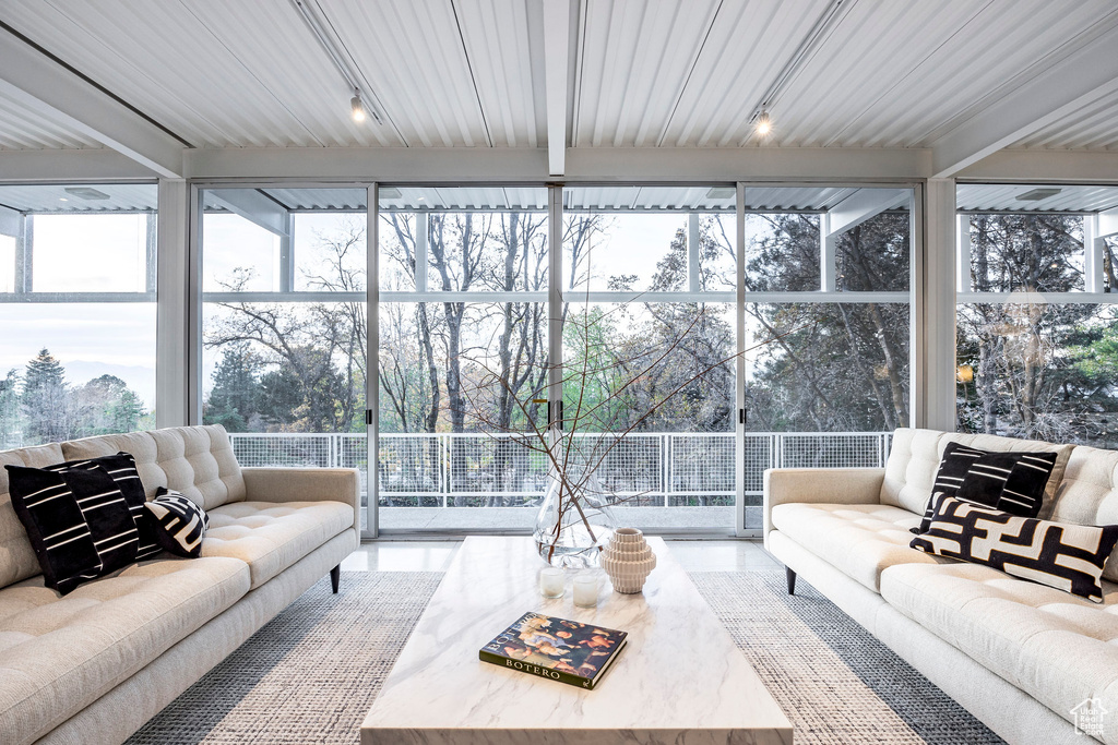 Sunroom featuring plenty of natural light