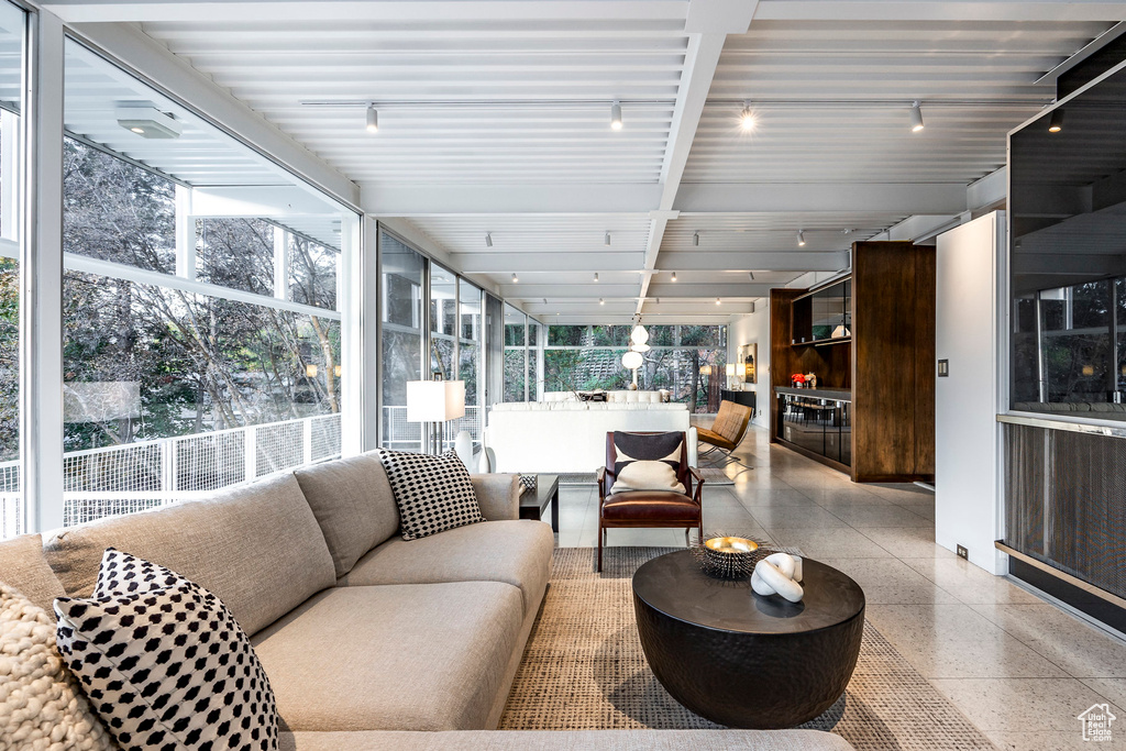 Sunroom with plenty of natural light and track lighting