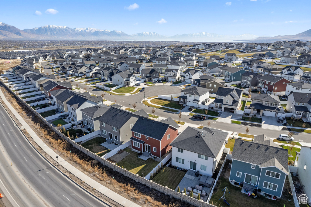 Birds eye view of property with a mountain view