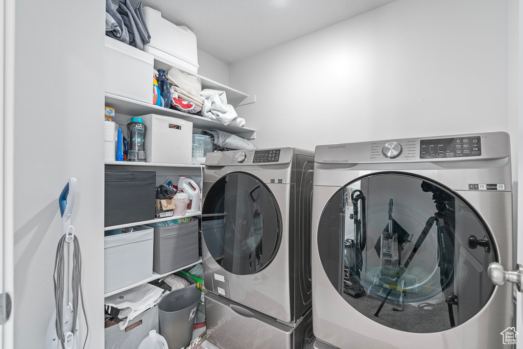 Clothes washing area with washer and clothes dryer