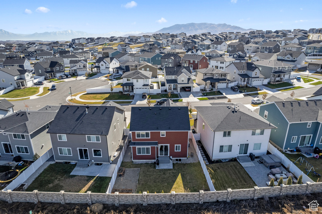 Birds eye view of property featuring a mountain view