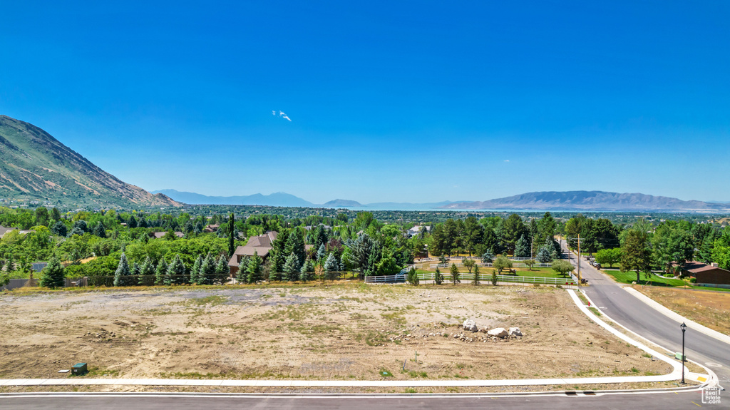 Property view of mountains with a rural view