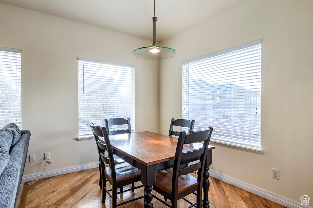 Dining space with light wood-type flooring