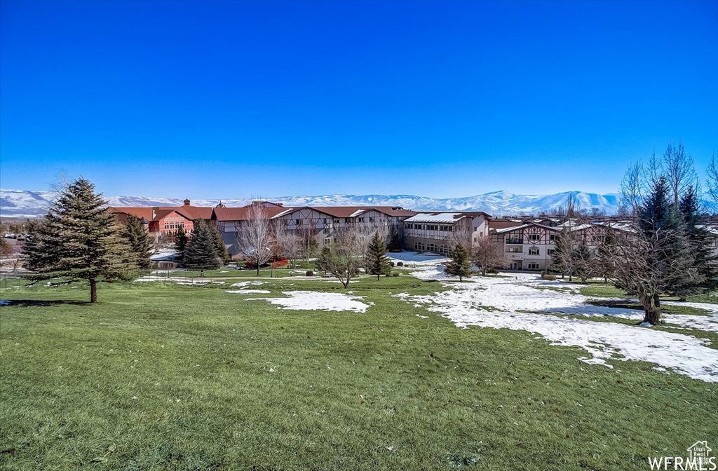 View of yard with a mountain view