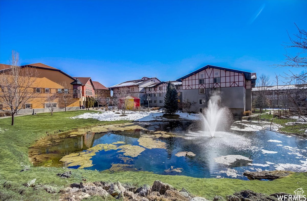 View of home\'s community featuring a yard