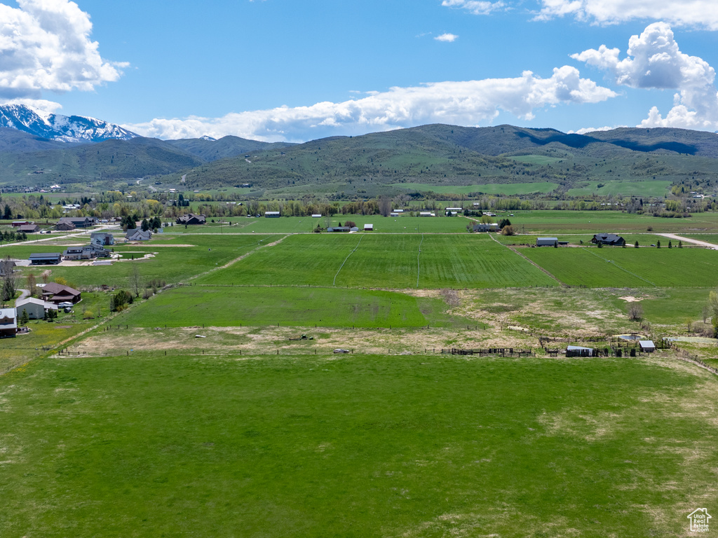 Exterior space featuring a rural view and a mountain view