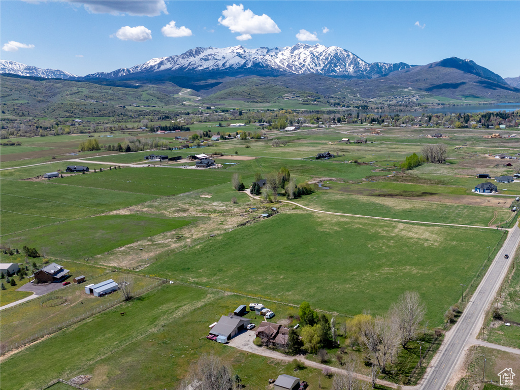 Drone / aerial view with a mountain view and a rural view