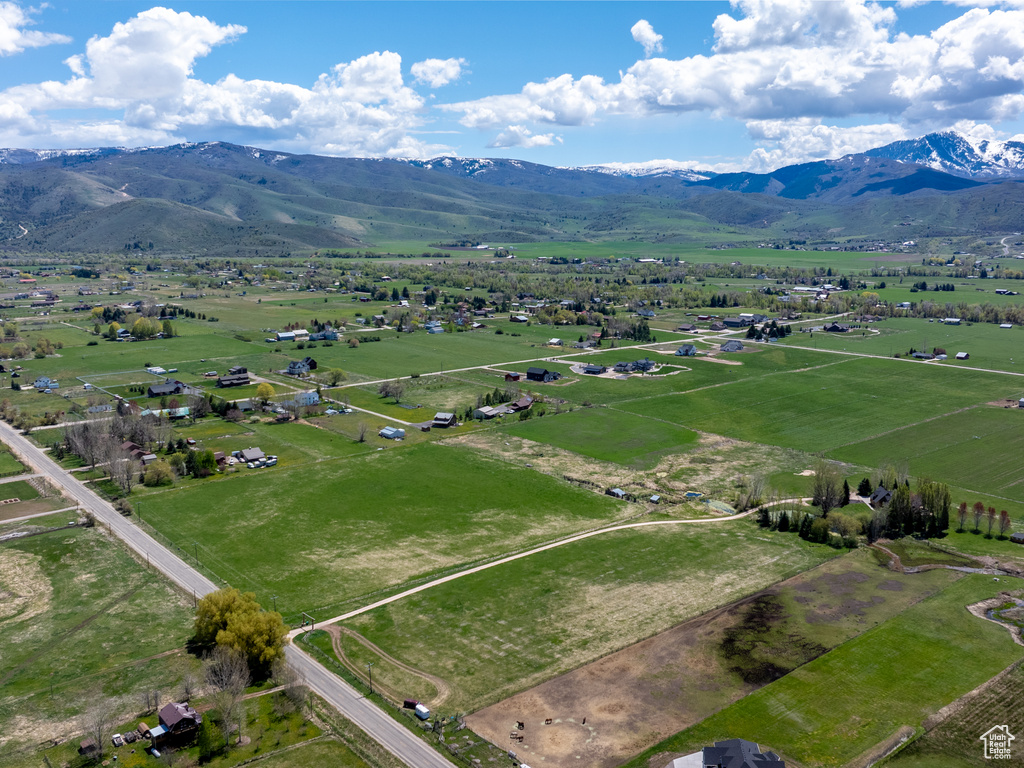 Aerial view featuring a rural view and a mountain view