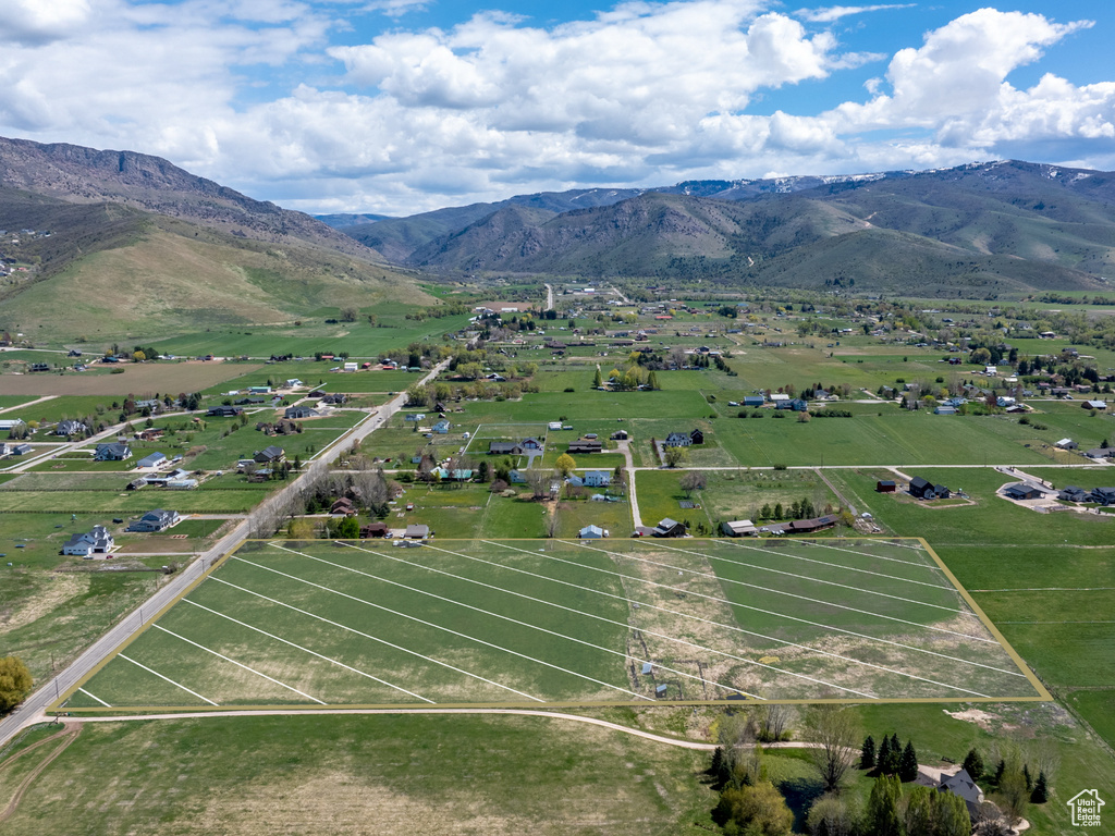 Birds eye view of property featuring a mountain view