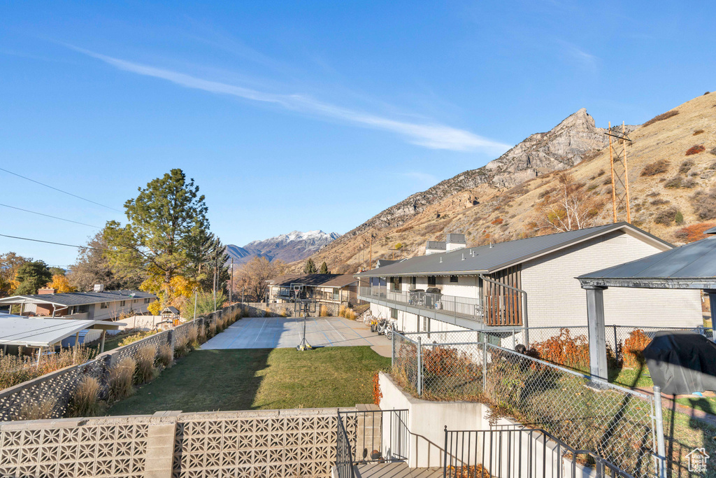 View of yard featuring a mountain view and a patio area