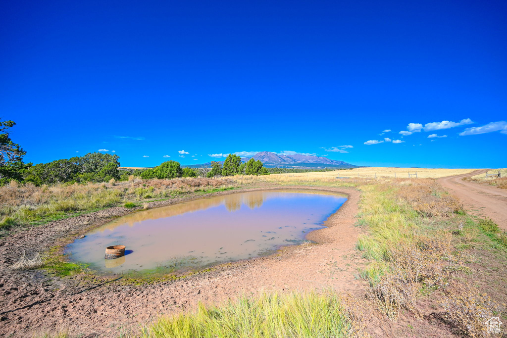 Property view of water with a mountain view