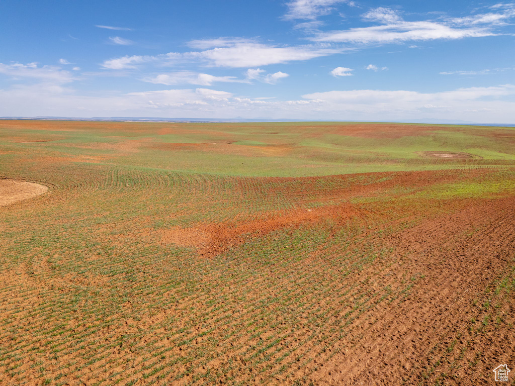 Birds eye view of property featuring a rural view