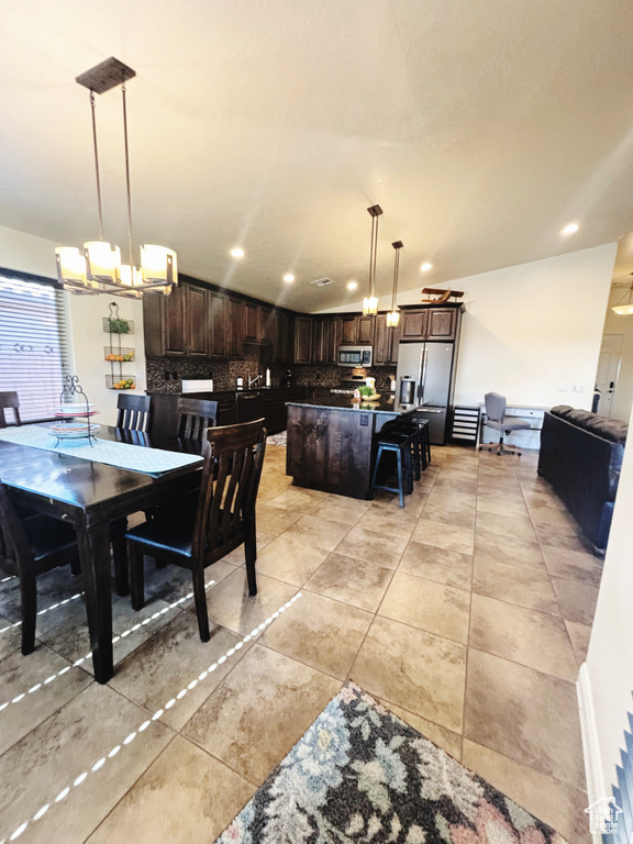 Dining space with a chandelier