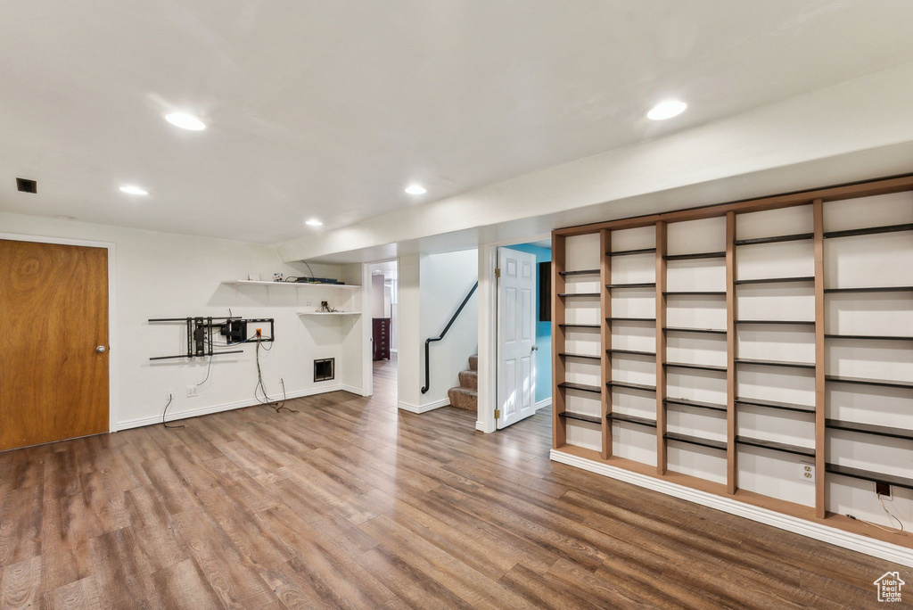 Basement featuring hardwood / wood-style floors