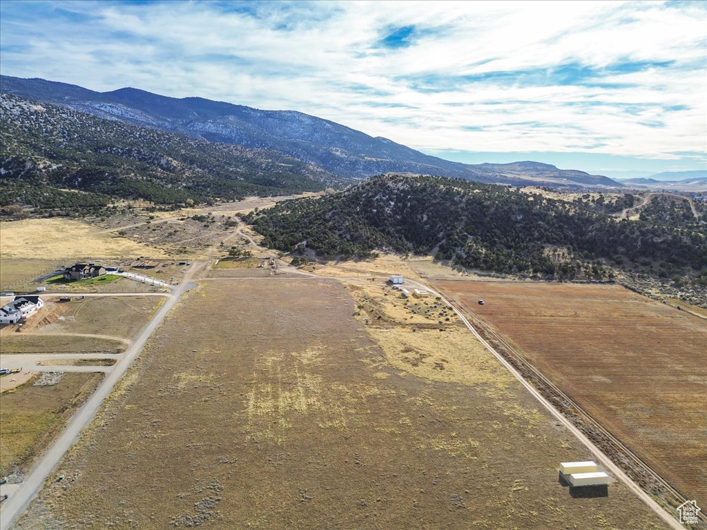 Birds eye view of property featuring a mountain view