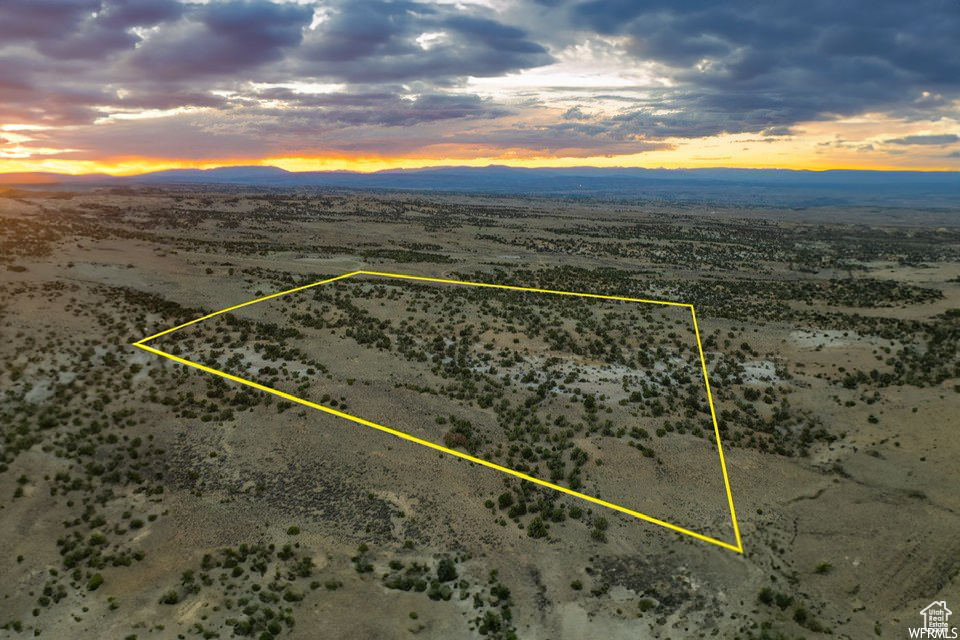 Aerial view at dusk with a mountain view