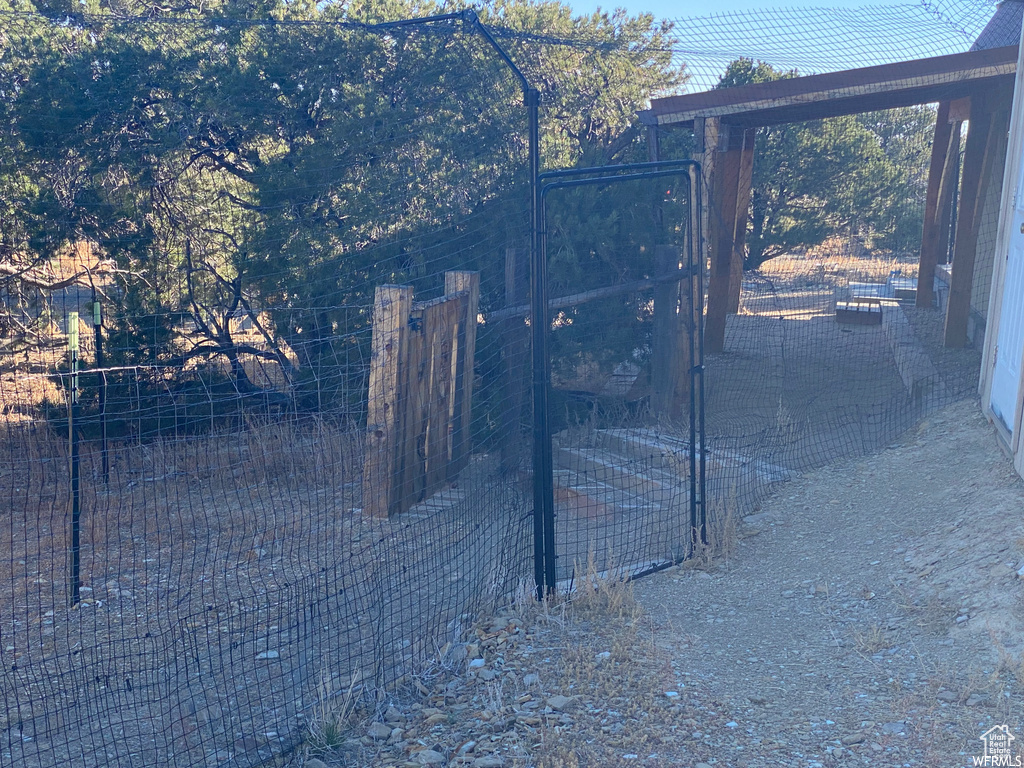 View of gate with an outdoor structure