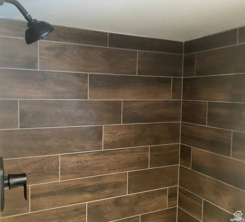 Interior details featuring tiled shower