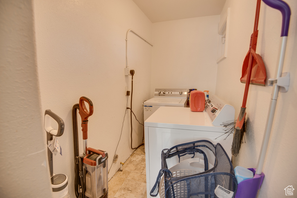 Laundry area featuring independent washer and dryer
