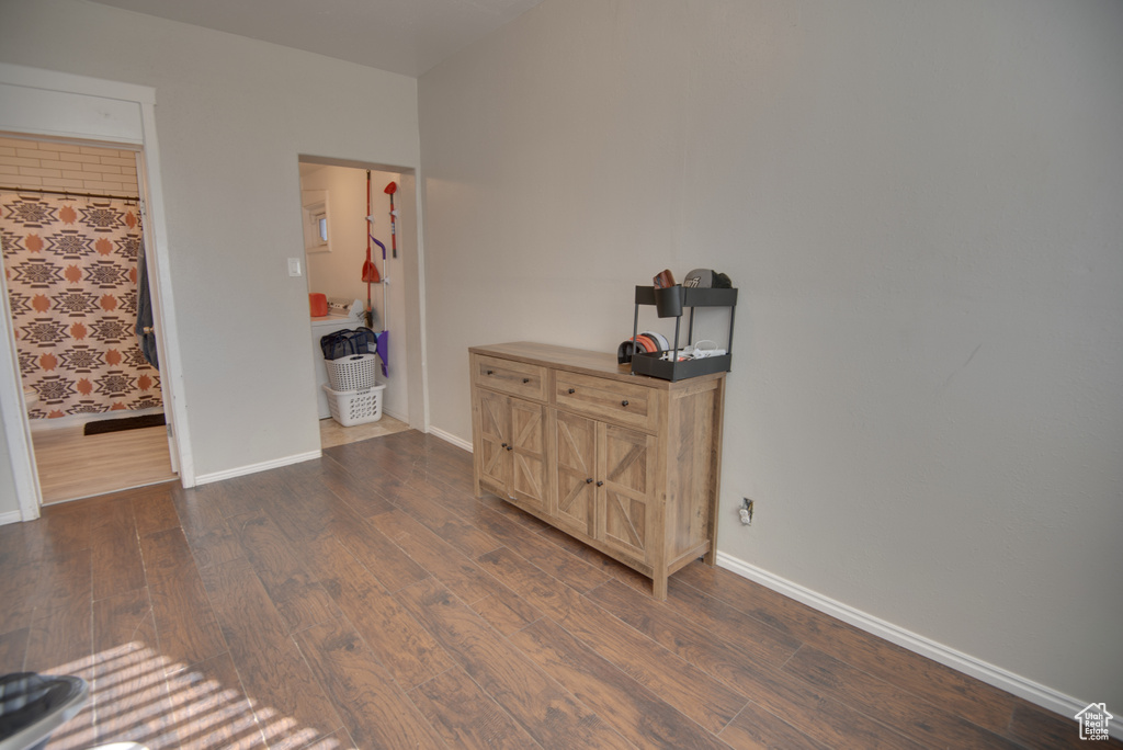 Bedroom featuring dark hardwood / wood-style floors
