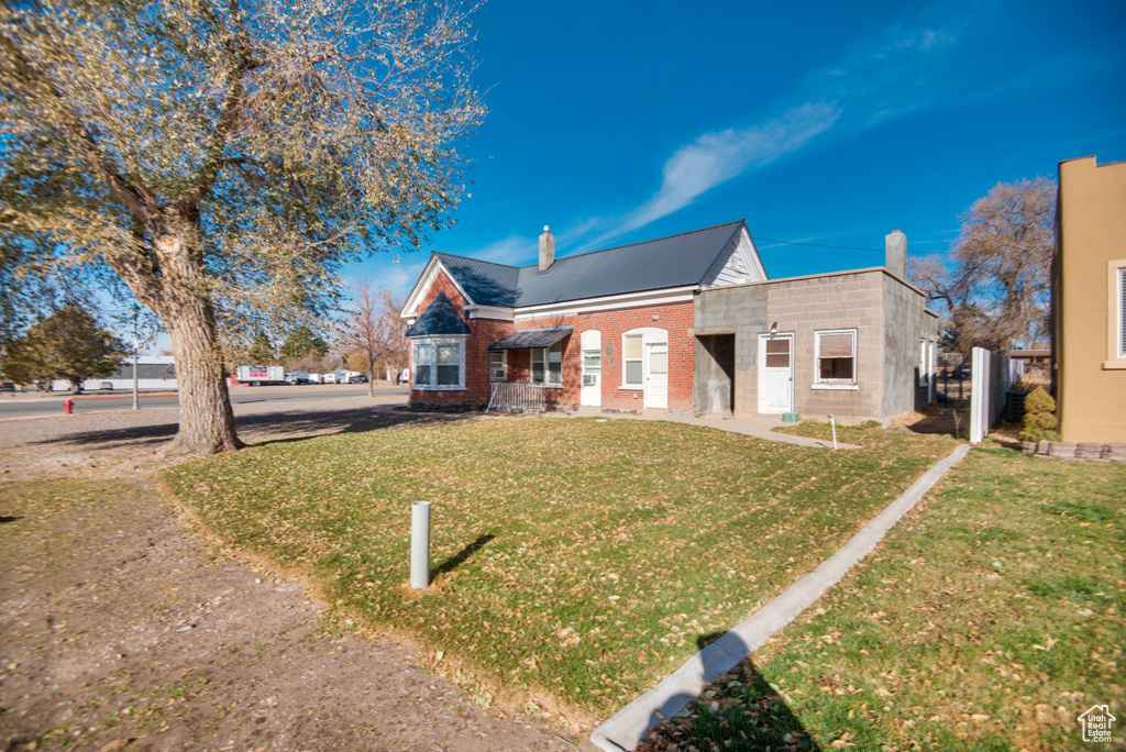 View of front of home with a front yard