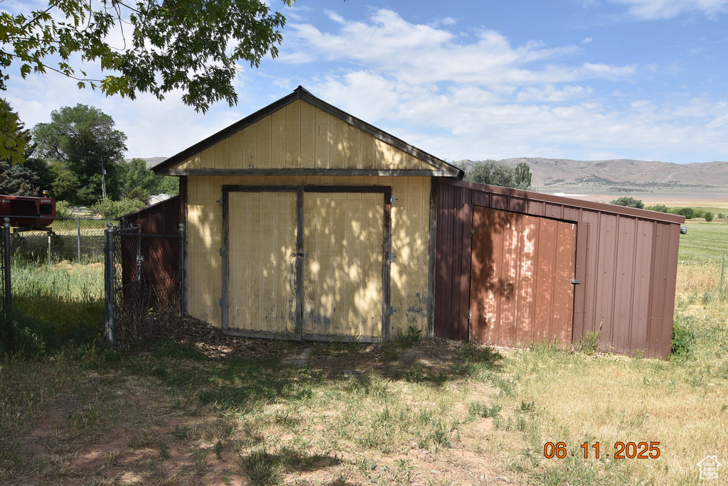 View of shed featuring a mountain view
