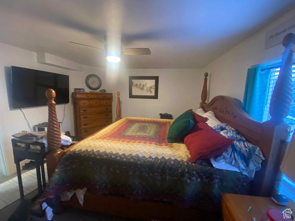 Bedroom featuring ceiling fan